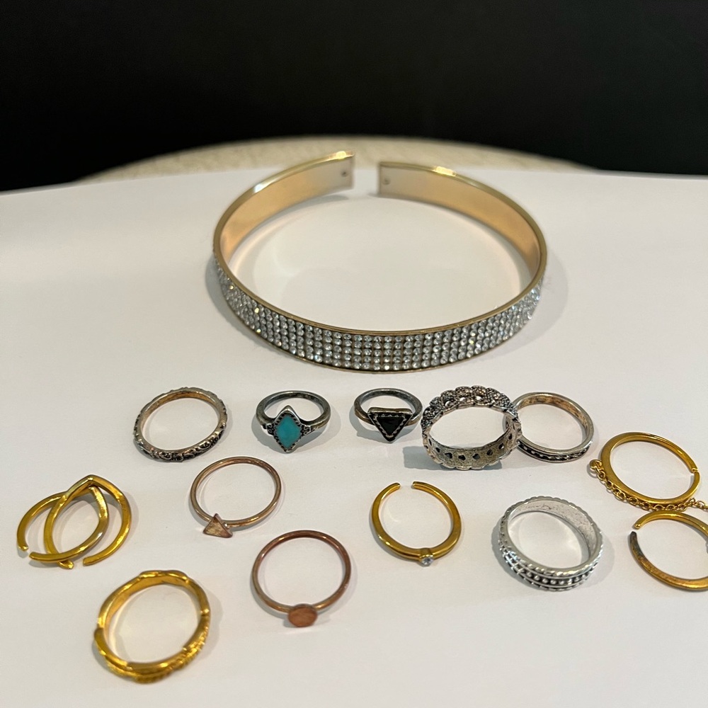 Elegant Gold toned and Silver toned Rings and a Bracelet with Crystal Accents.